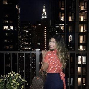 Orange flower print shirt